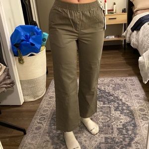 Brand new, with tags, TNA olive leaf green Christie pant.
